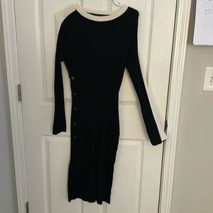 Black ribbed long sweater dress with white stripe